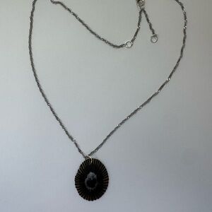 Adjustable silver limpet necklace